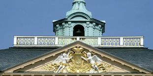 Gable with Baden's coat of arms beneath the "golden man," Rastatt Residential Palace.